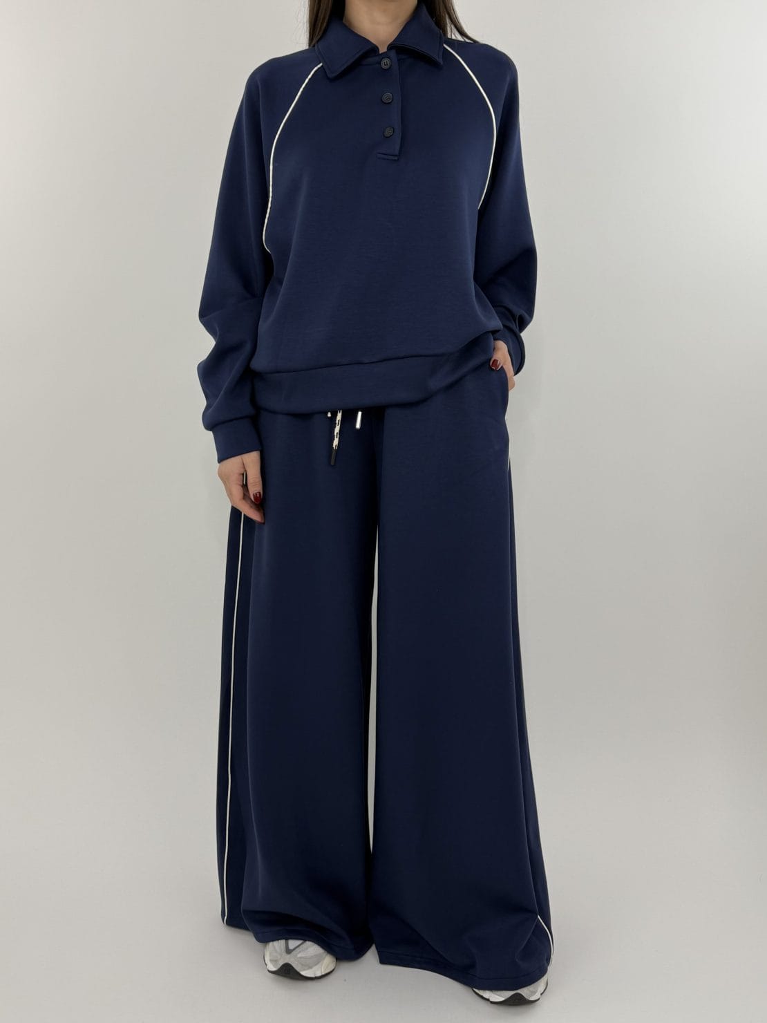 Felpa polo blu con riga