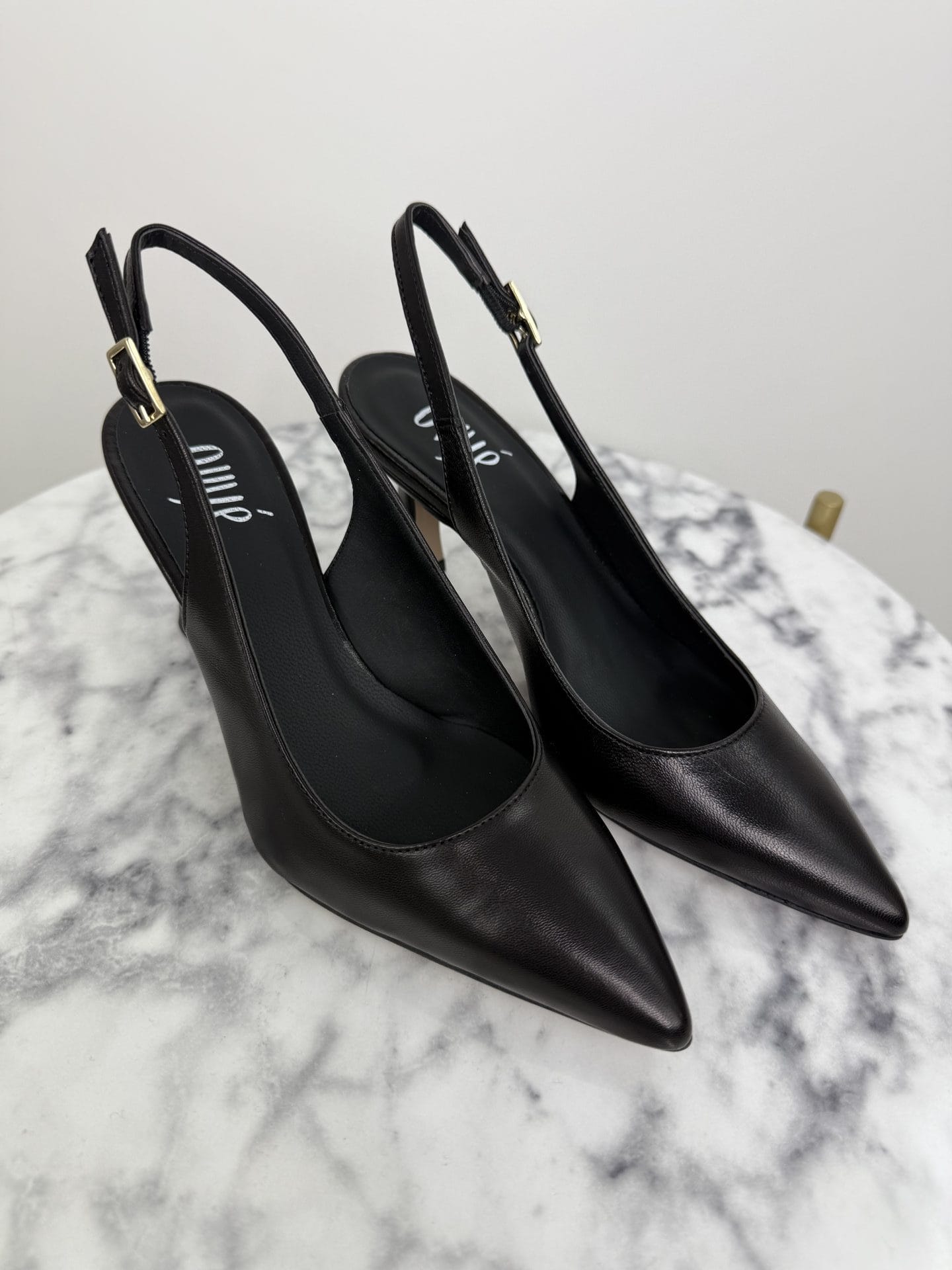 Slingback nero fibbia oro