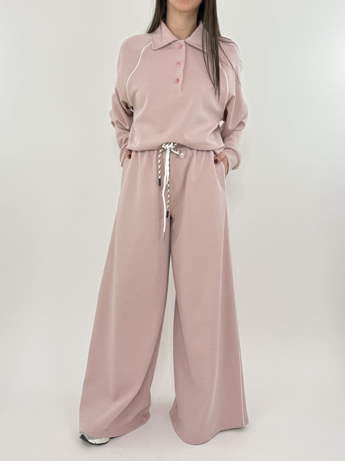 Felpa polo rosa con riga