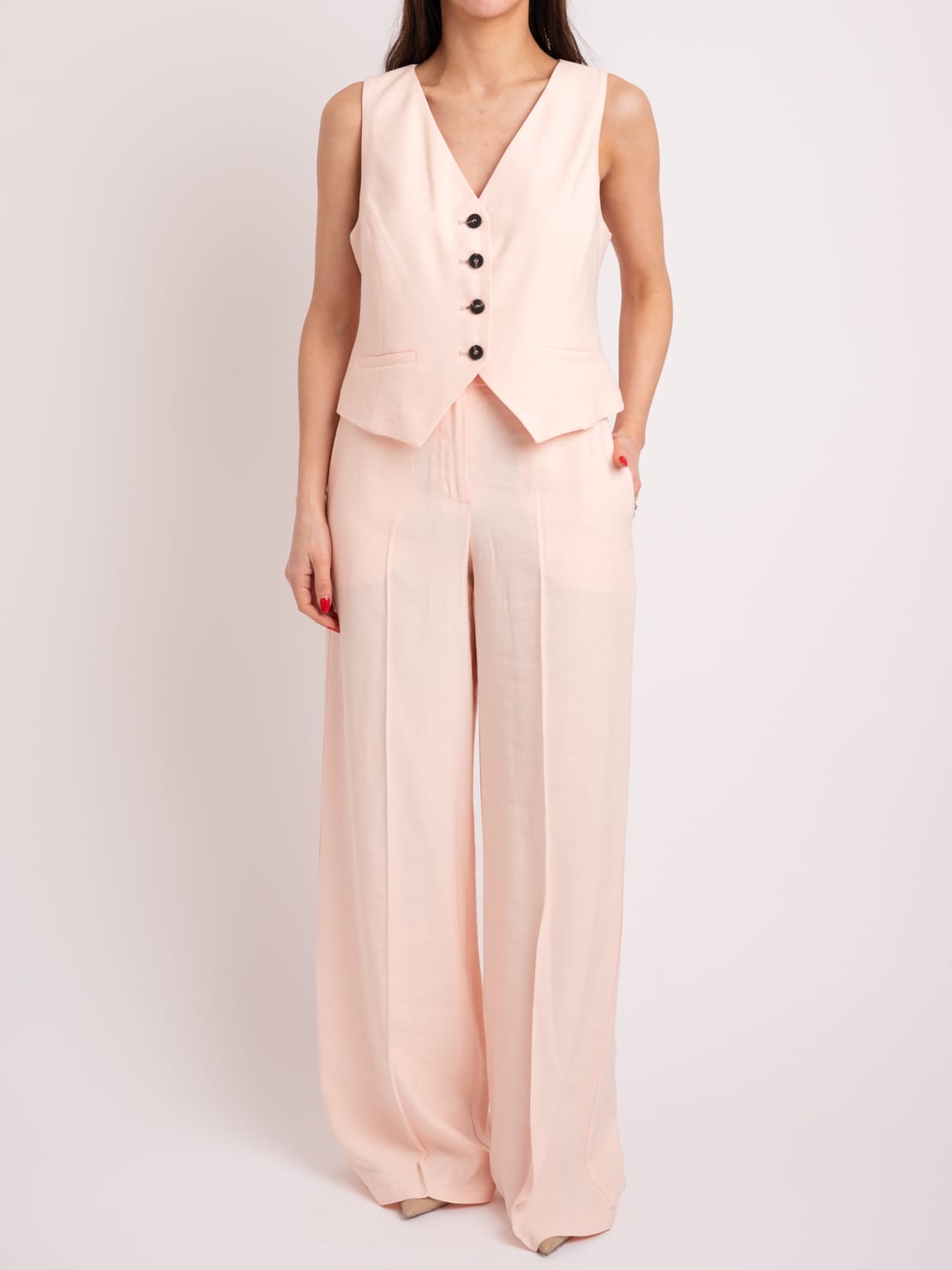 Completo gilet + pantalone rosa