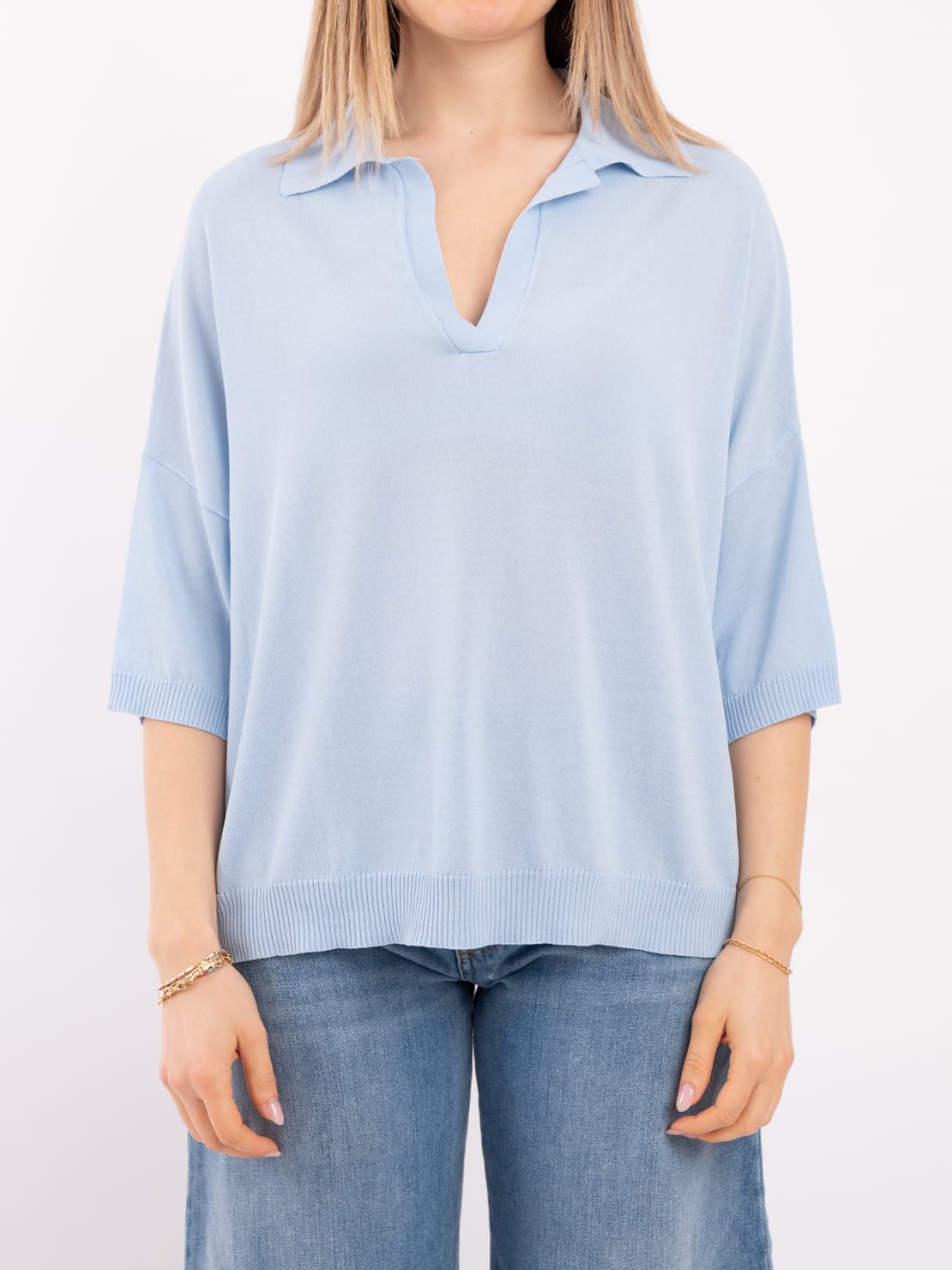 Polo scollo V azzurro