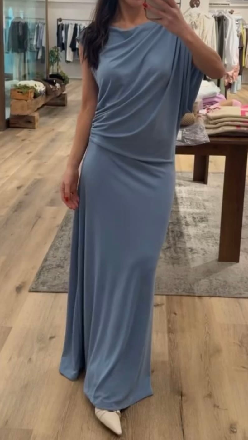 Abito smanicato drappeggio celeste