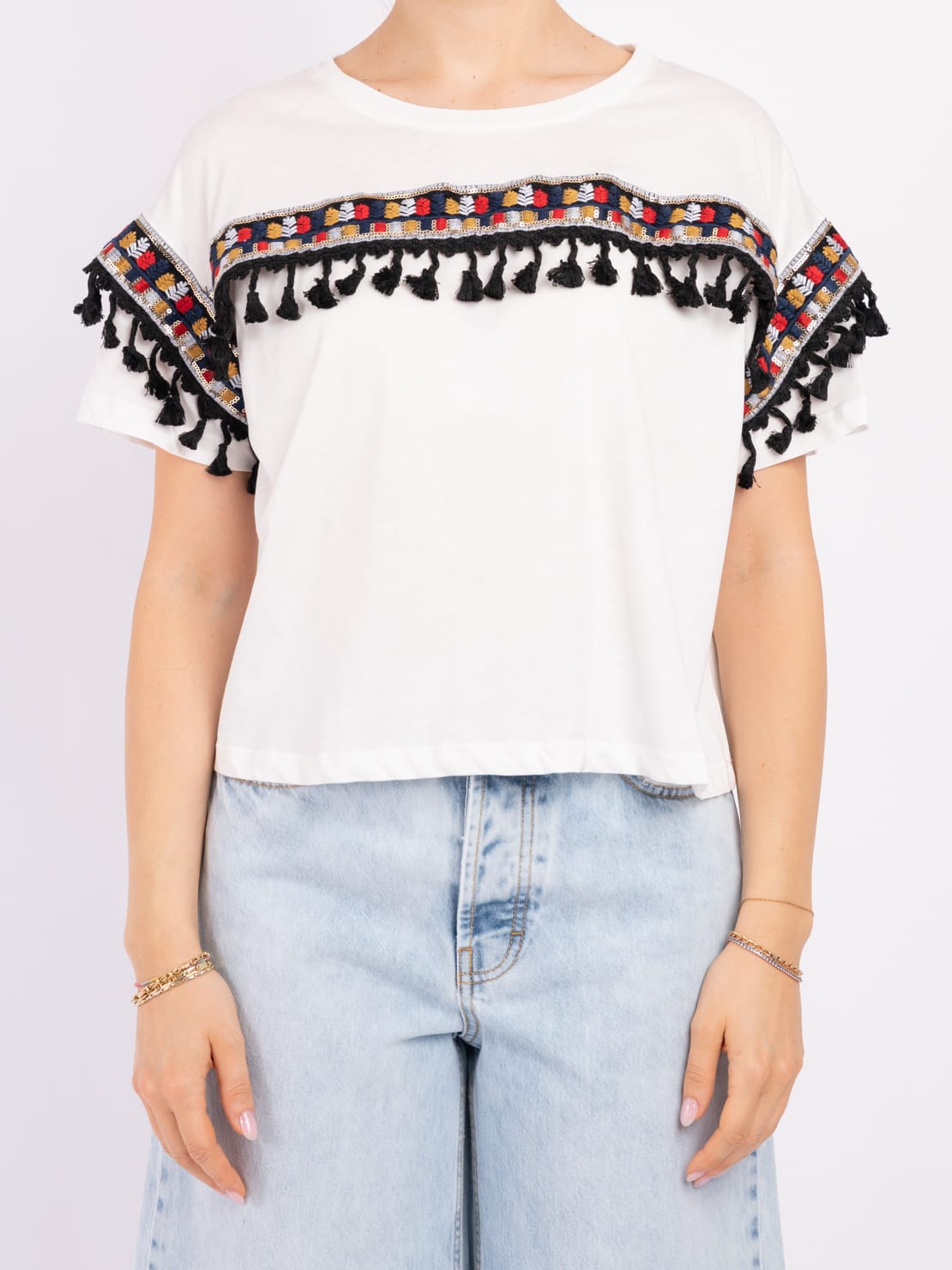 Maglia decorazione nappine