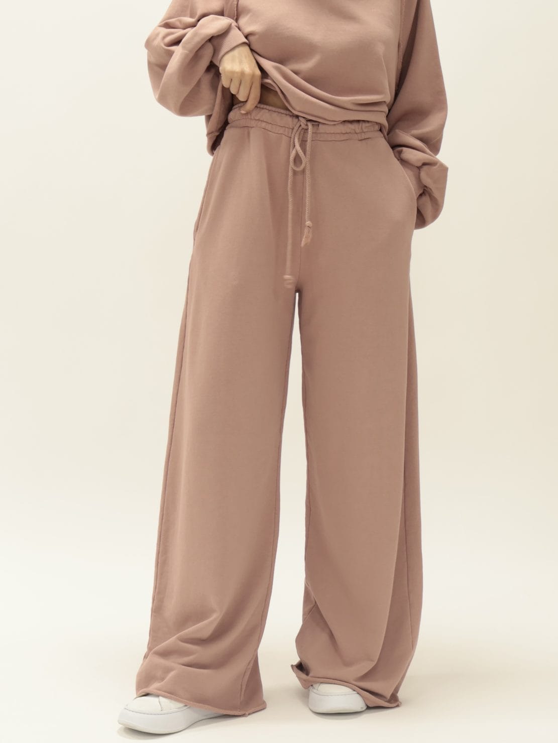 Pantalone in felpa taglio vivo rosa