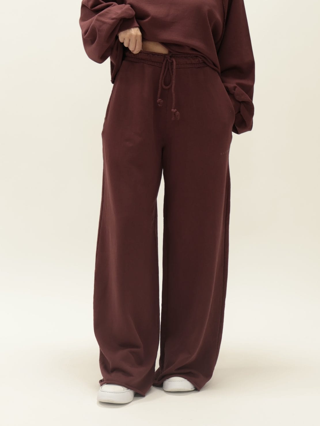 Pantalone in felpa taglio vivo bordeaux