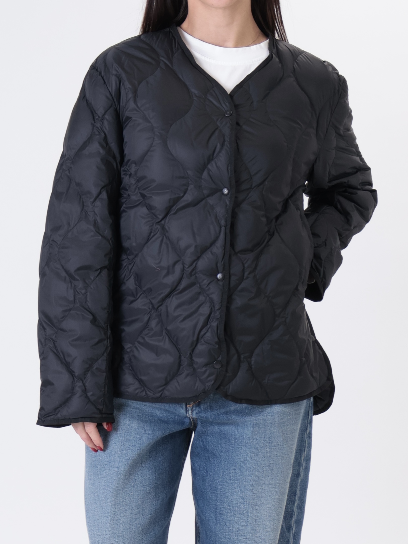 Piumino con impunture nero