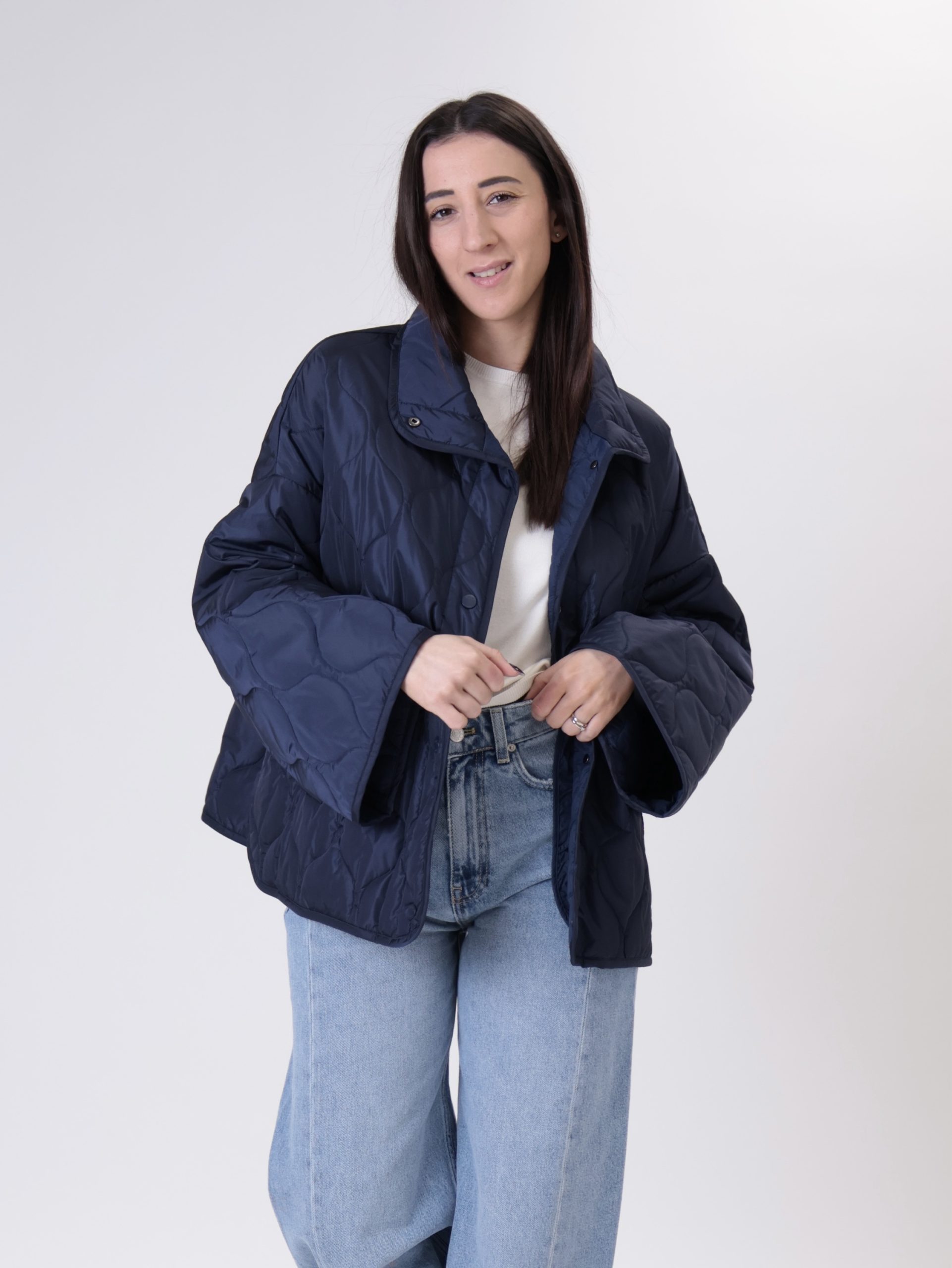 Piumino colletto blu