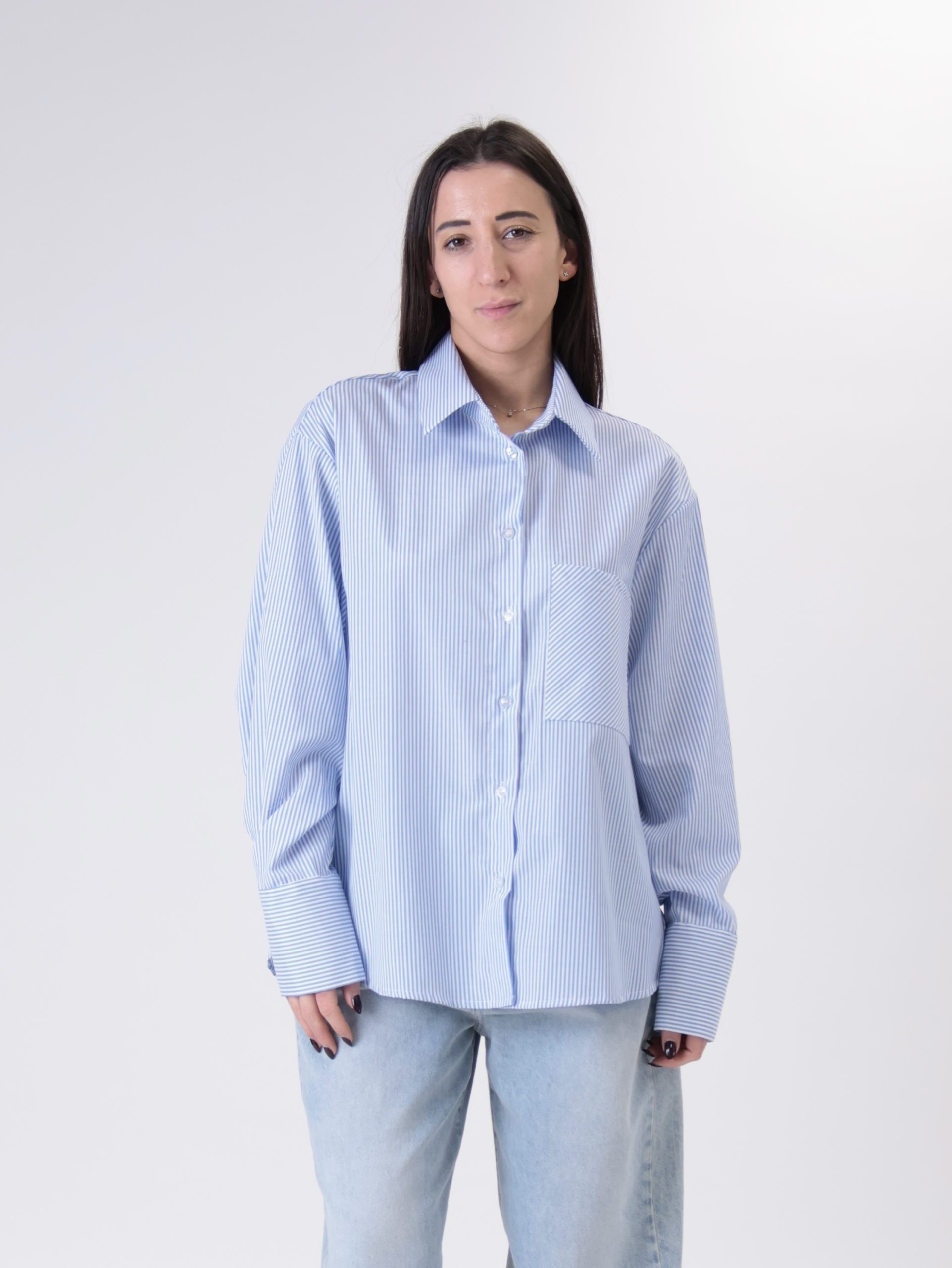 Camicia tasca riga celeste